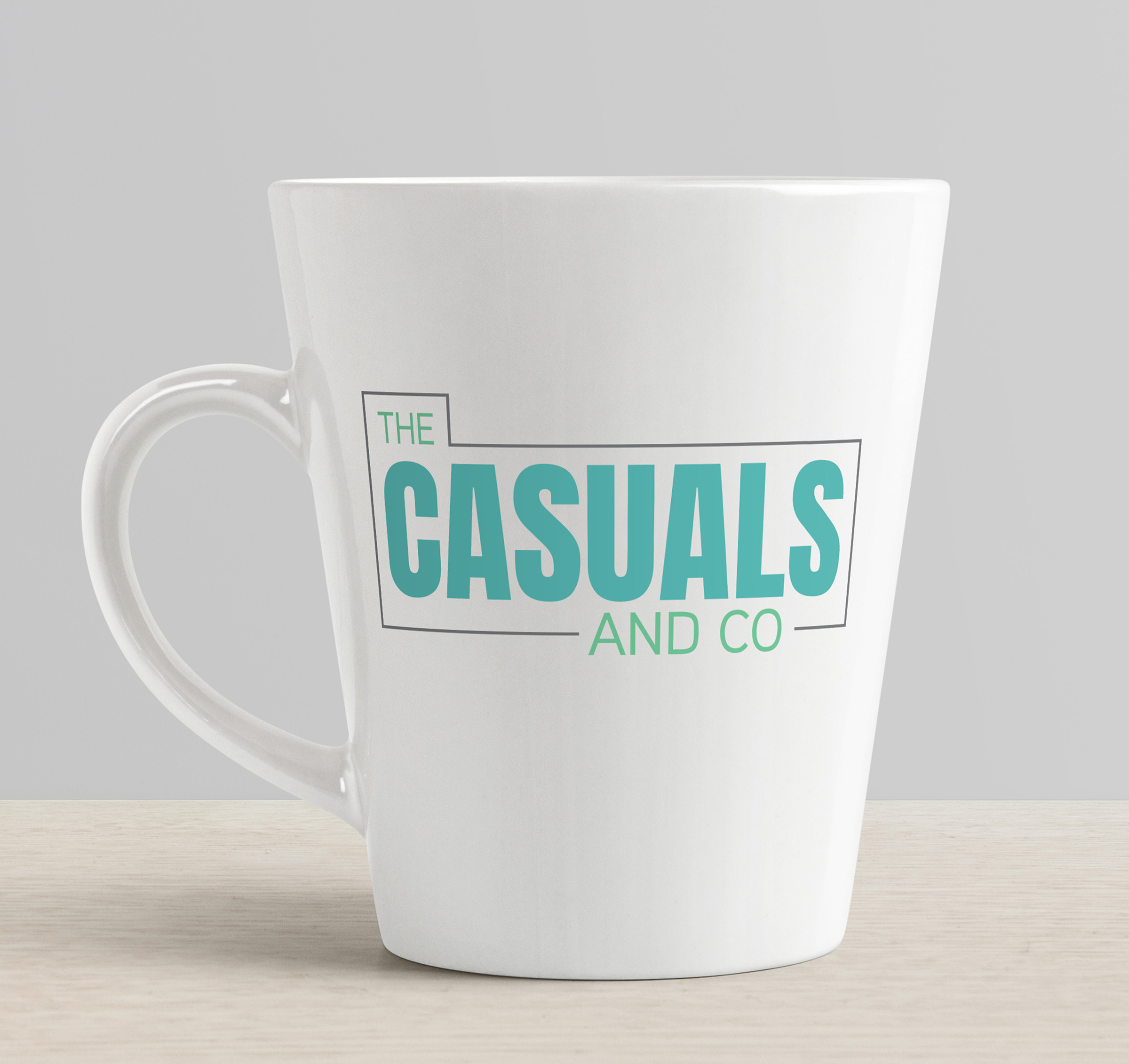 The Casuals and Company's Logo on a white mug